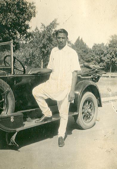 1931_beside_his_car